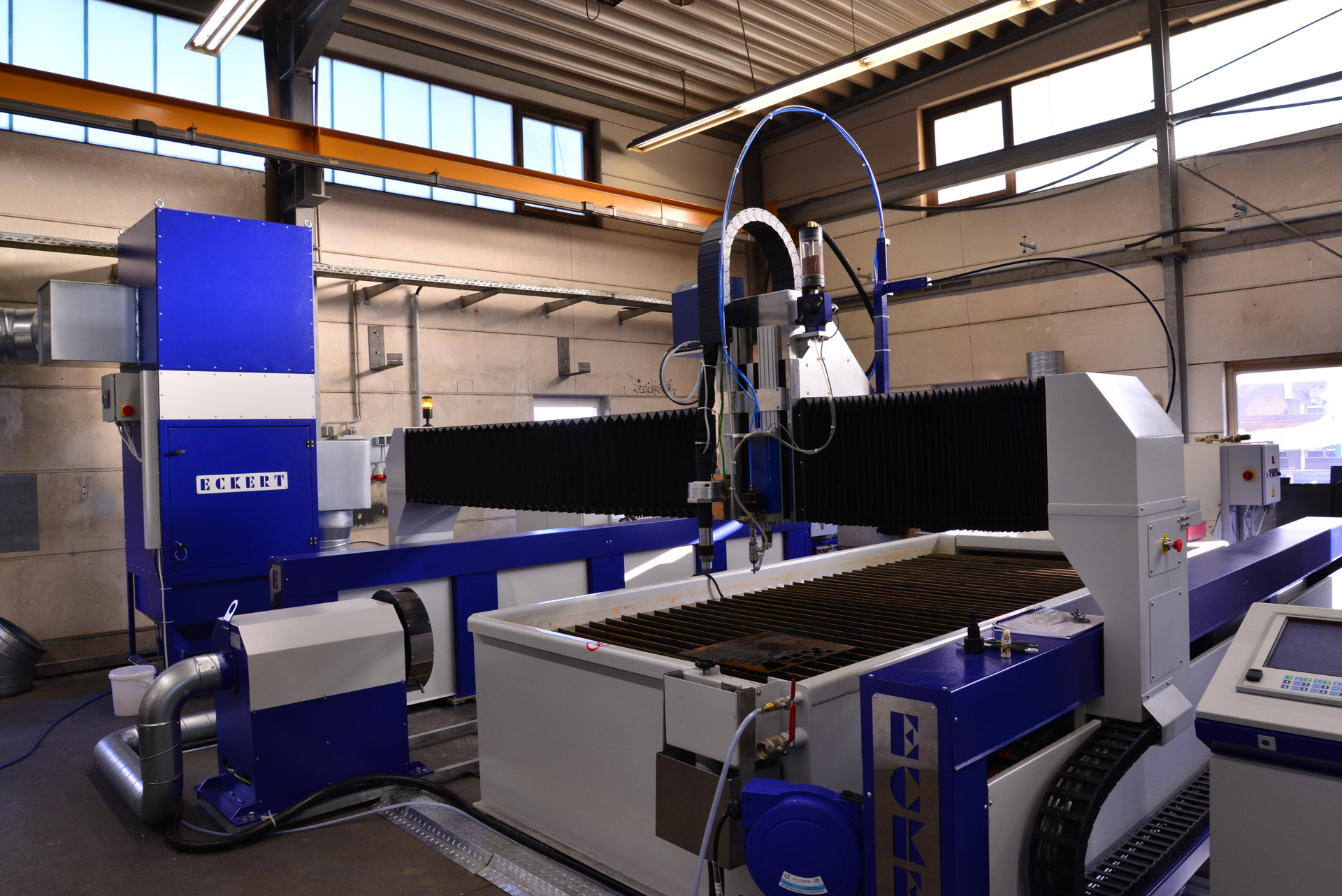 Waterjet with plasma cnc cutting machine with rotator and ventilation at production hall